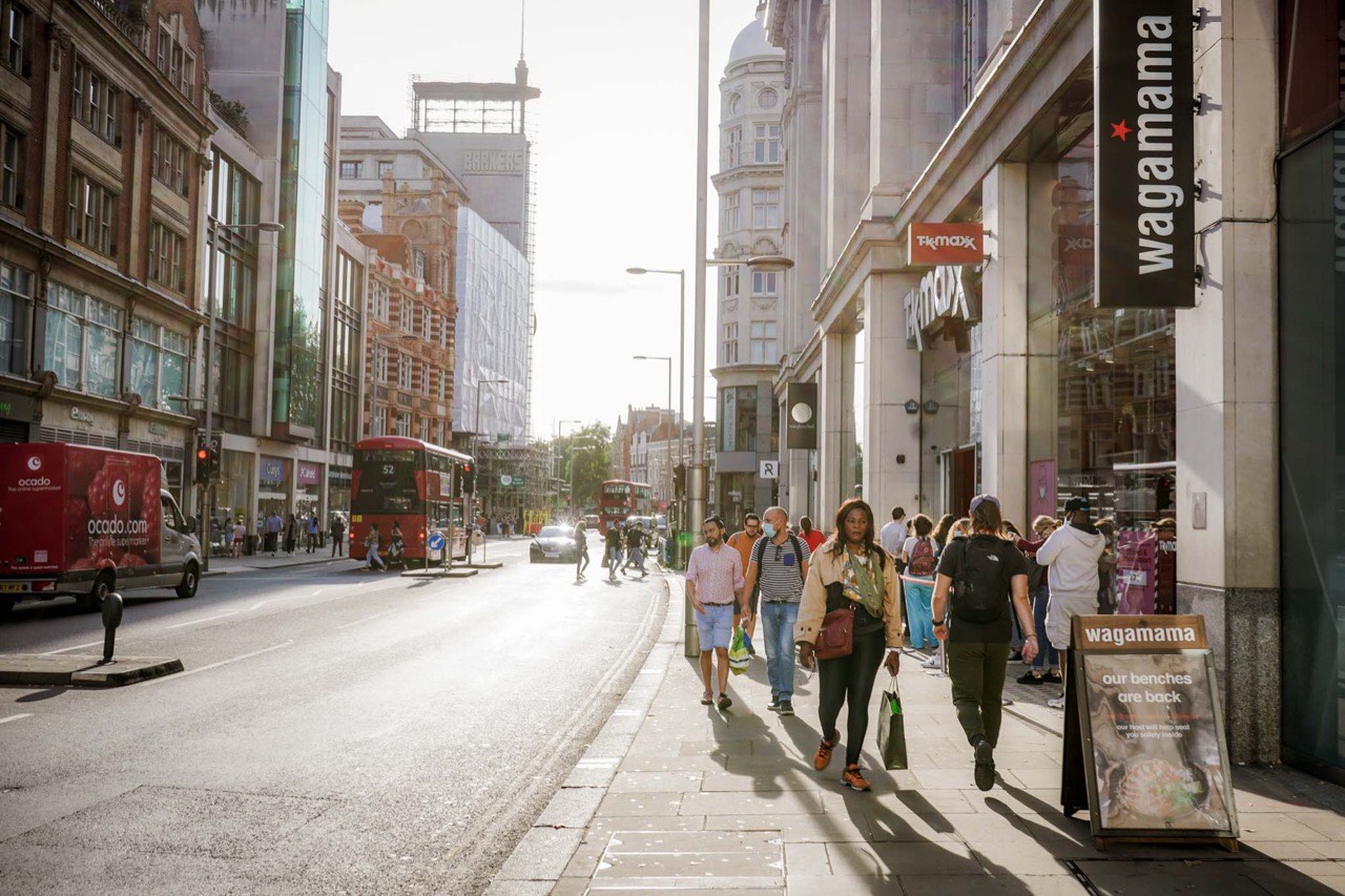 a busy London high street with shops near Newham, London